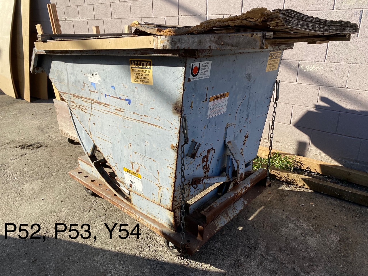 Tipable (by a Pull String) Metal Garbage Bin